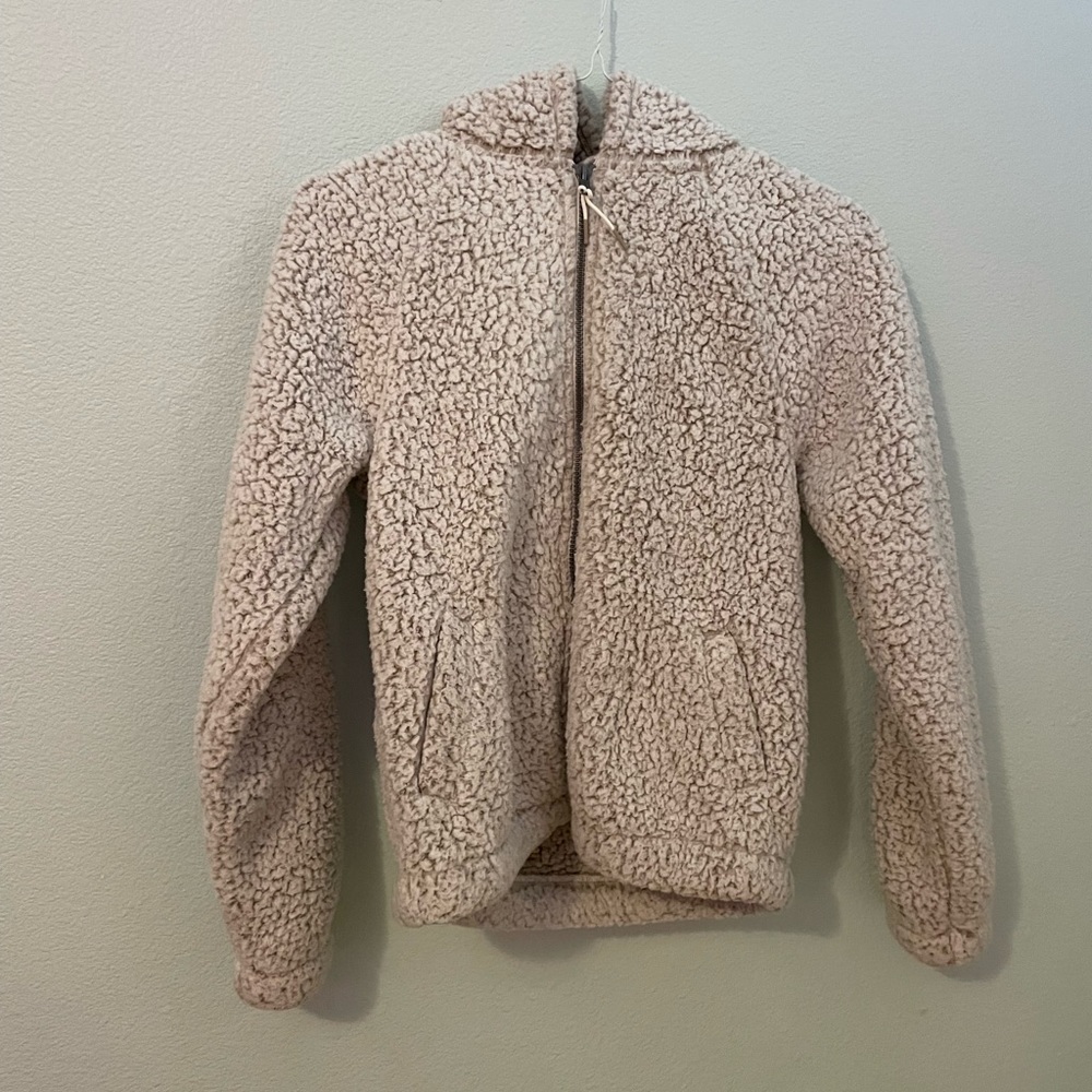 fluffy light pink sweater